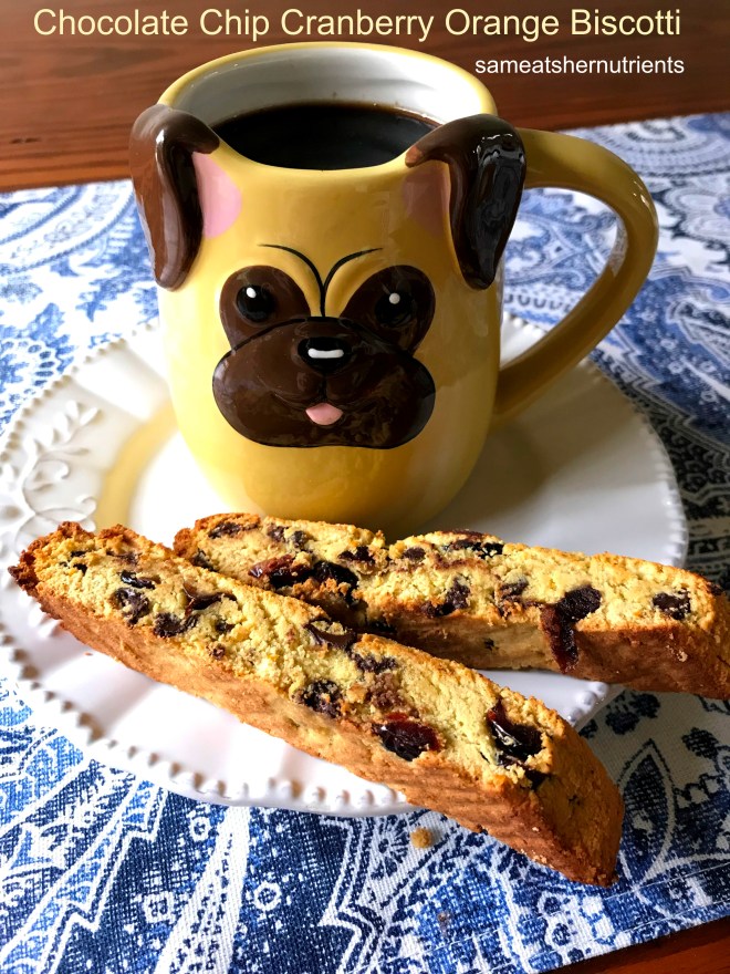 Chocolate Chip Cranberry Orange Biscotti On a Plate with a Pug Mug - Grain Free